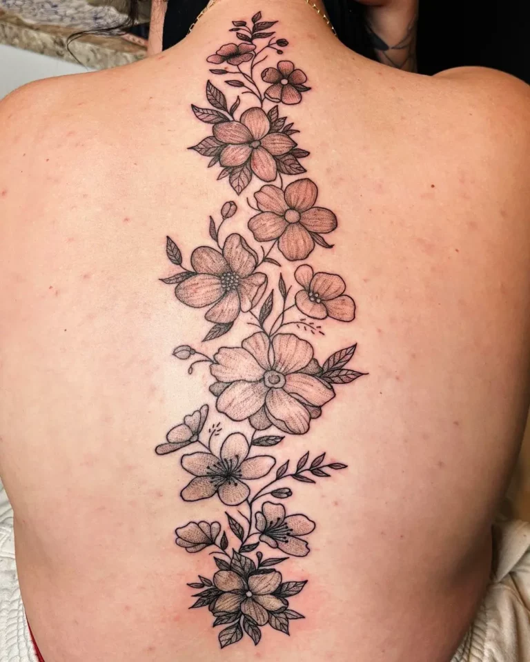 Blooming Spine Flower Tattoo