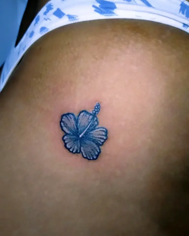 Blue Butterfly Symbol Tattoo