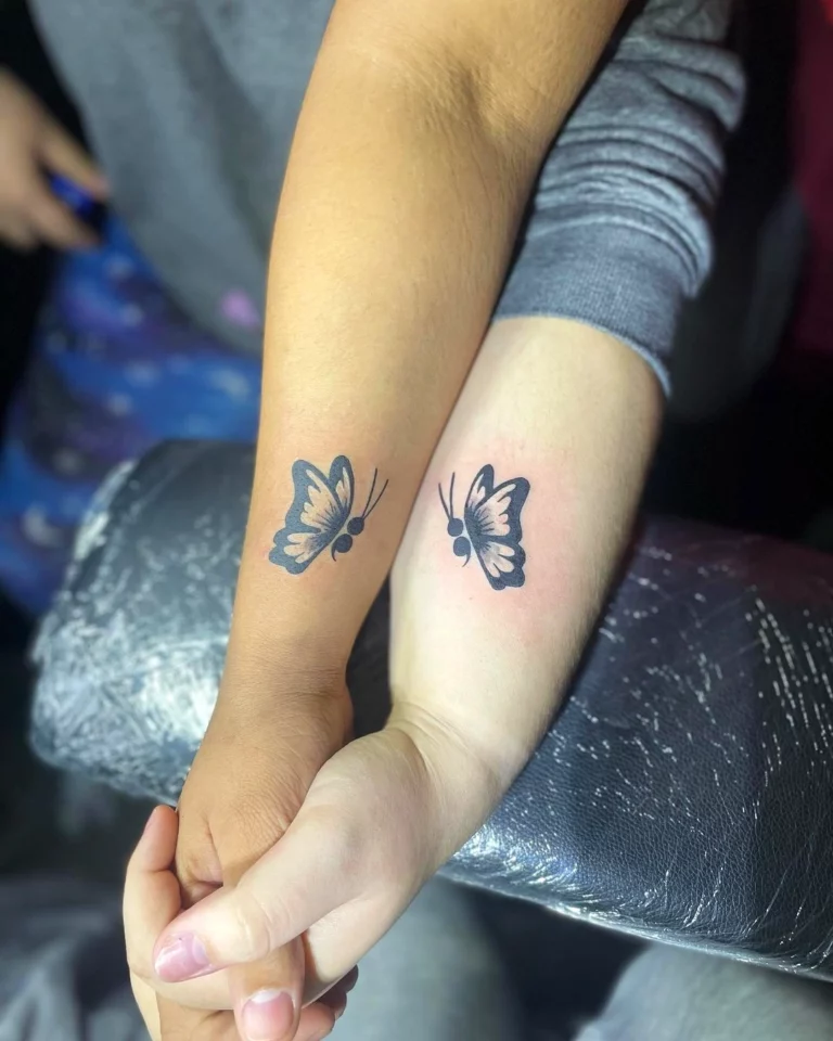 Butterfly Embrace Strength Tattoo