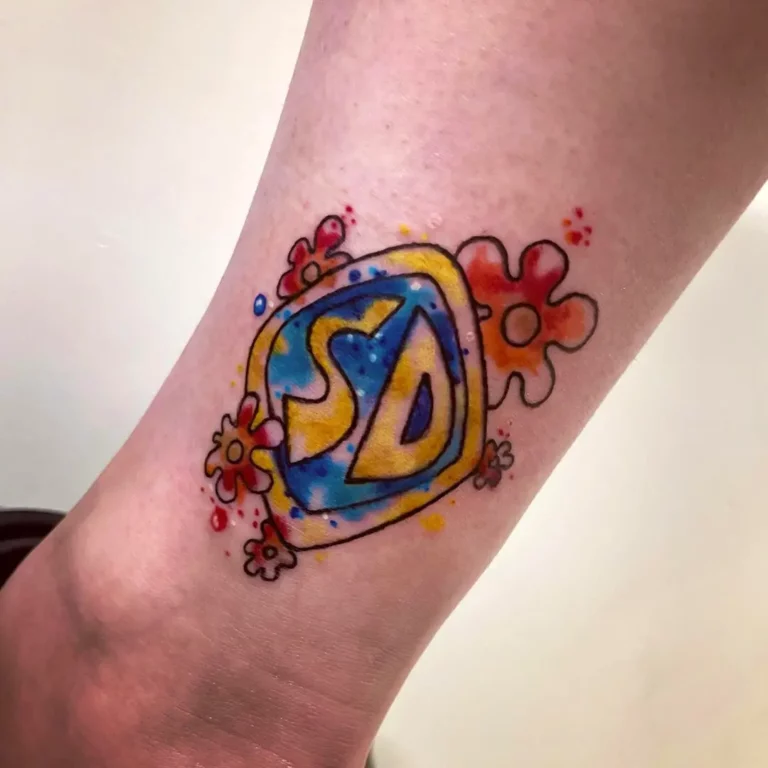 Colorful Watercolor Initial Tattoo