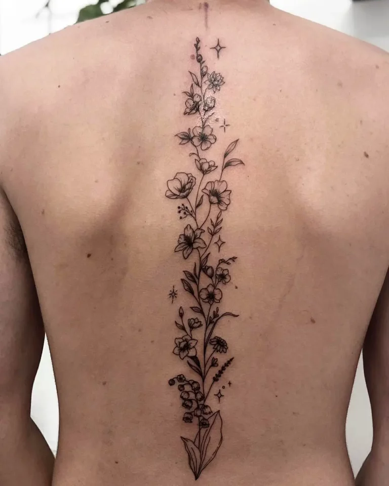 Energetic Floral Spine Tattoo