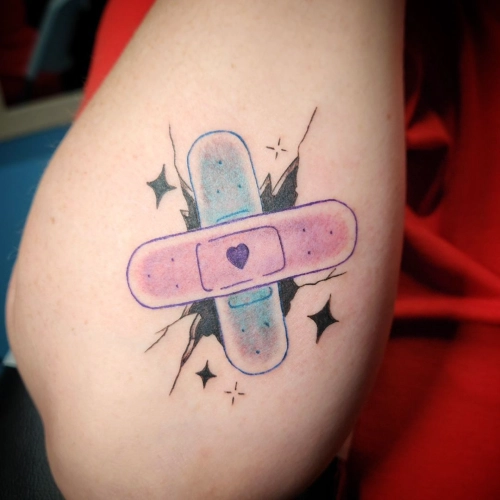 Healing Heart Bandage Tattoo