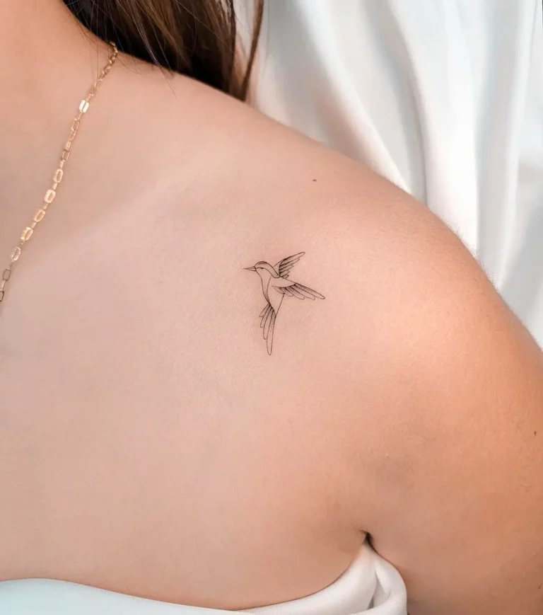 Minimalist Flying Hummingbird Tattoo