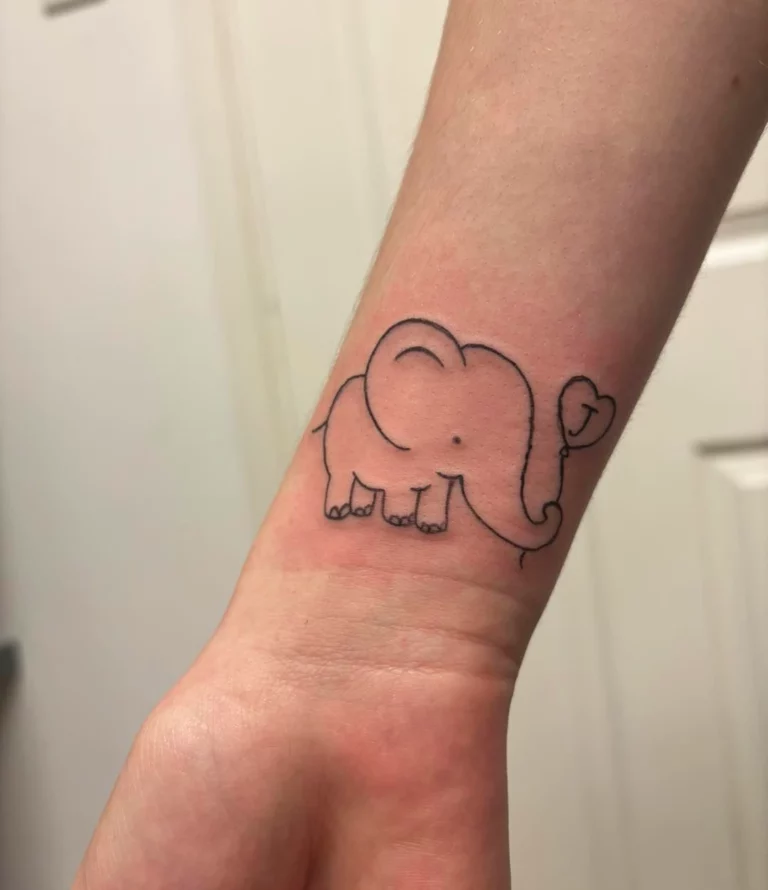 Simplistic Elephant Outline Tattoo