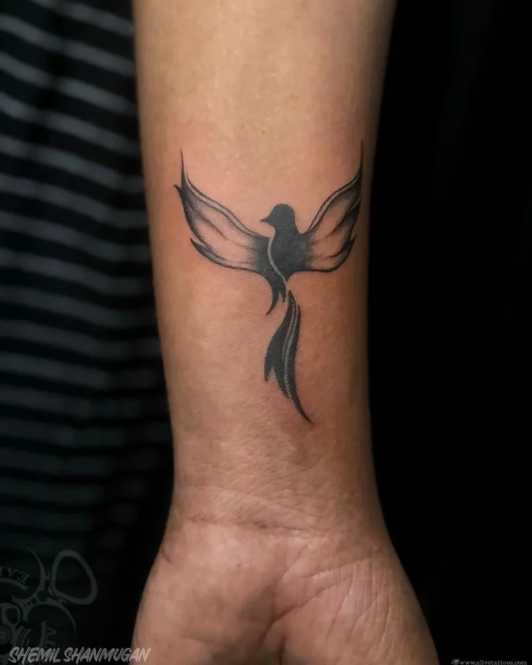 Soaring Bird Silhouette Tattoo