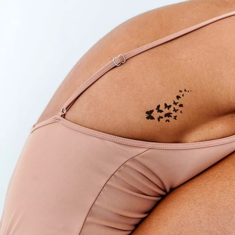 Swarm of Butterfly Silhouette Tattoo