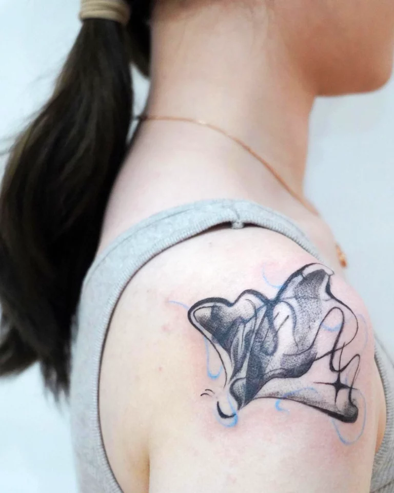 Whimsical Butterfly Tribute Tattoo